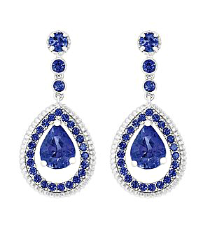Stark white gold intensifies the impact of 3.7 carats of sapphires.