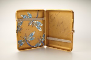 A gift from Tsar Nicholas II and his wife to her brother, this dragonfly-emblazoned cigarette case is engraved with the words, “For darling Ernie, from Nicky + Alix."