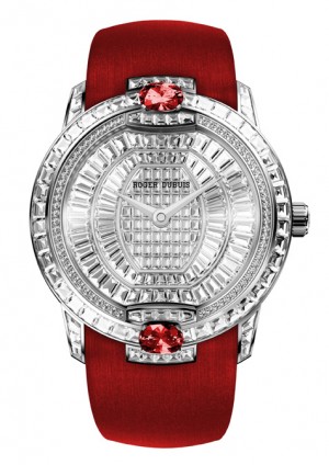The Velvet Haute Joaillerie with rubies, by Roger Dubuis, is a watch for women. It boasts diamonds, two rubies, and a red belt.