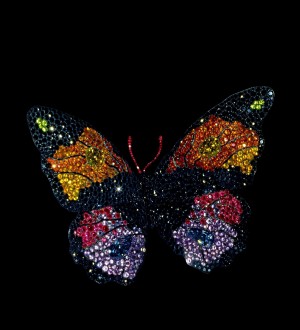 "Butterfly Brooch," 1994. Sapphires, fire opals, rubies, amethyst, garnets, diamonds, silver, and gold. Private collection. Photograph by Katharina Faerber; courtesy of JAR, Paris.