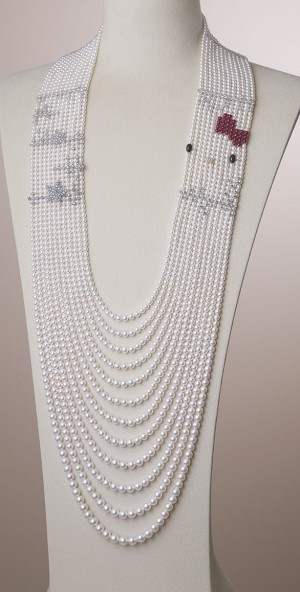The Hello Kitty necklace is made of 12 strands of AAA akoya pearls accented with diamonds. It includes Hello Kitty’s trademark bow made of rubies, onyx eyes and pave diamond encrusted yellow gold nose. Photo courtesy Sanrio/Hello Kitty.