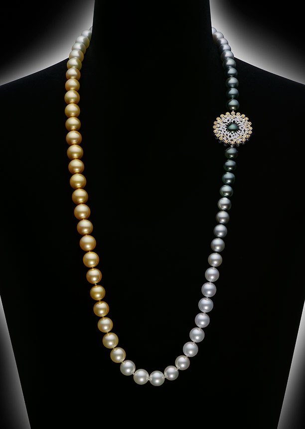 The Sun & Cloud necklace uses a three-color graduation to mimic the day as it passes from darkness to light. Photo: Mikimoto America.