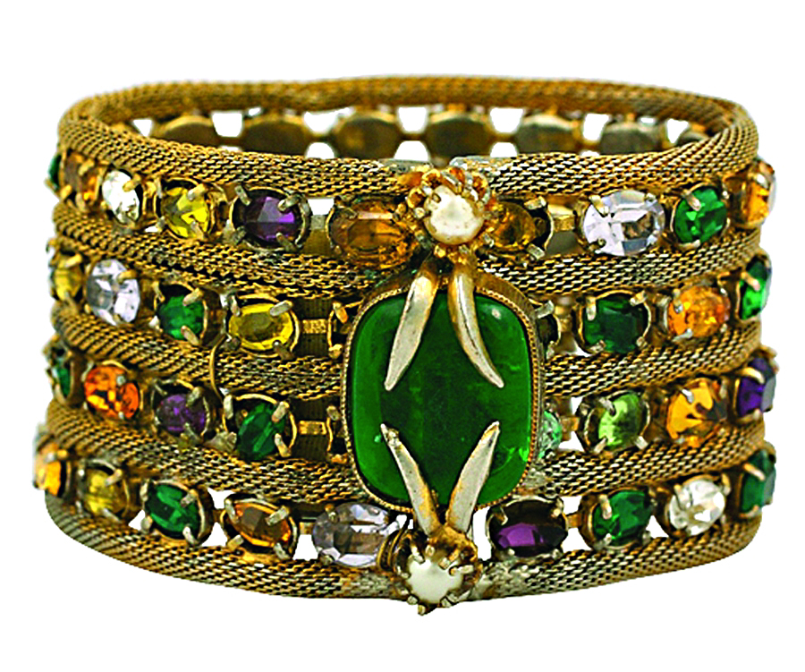 1.This striking bracelet was once the property of Mlle. Coco Chanel. It uses faux amethysts, topazes, emeralds and crystal. Photo courtesy of 1stdibs.