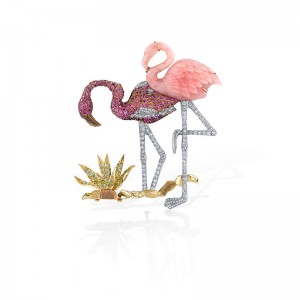 Pink opal, diamond, black diamond, pink sapphire and demantoid green garnets are set in platinum 900 & 18k yellow gold to create two colorful flamingos.  Movement in the left flamingo's head and in the grass are more examples of Basta’s kinetic additions.