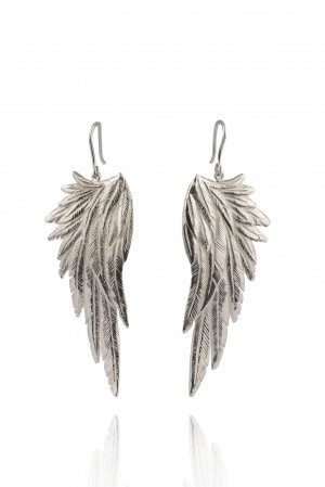 Sterling silver Wings earrings by Sheeva Moshiri in the form of feathers with a 3D effect inspired by the feathers on Native American dreamcatchers, a handmade object decorated with sacred items such as feathers and beads and believed by American Indians to assure good dreams. Image courtesy of Sheeva Moshiri.