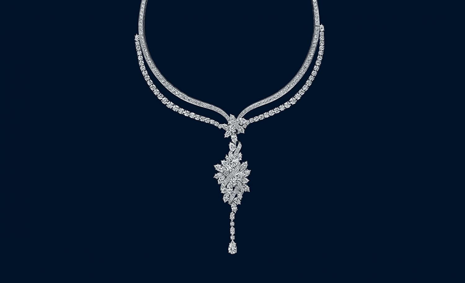 The Secret Cluster diamond necklace can be draped and worn in different ways such as a sautoire, a three row necklace, or a back drop pendant. Photo courtesy: Harry Winston.