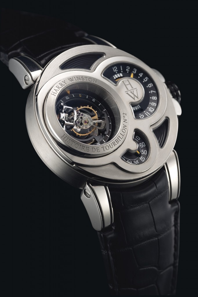 The hours on the Harry Winston Histoire de Tourbillon No. 2 watch are displayed in a retrograde scale at 9 o’clock, while the minutes are shown in a disc at 6 o’clock, and the seconds can be seen on a disc via the tourbillon. 