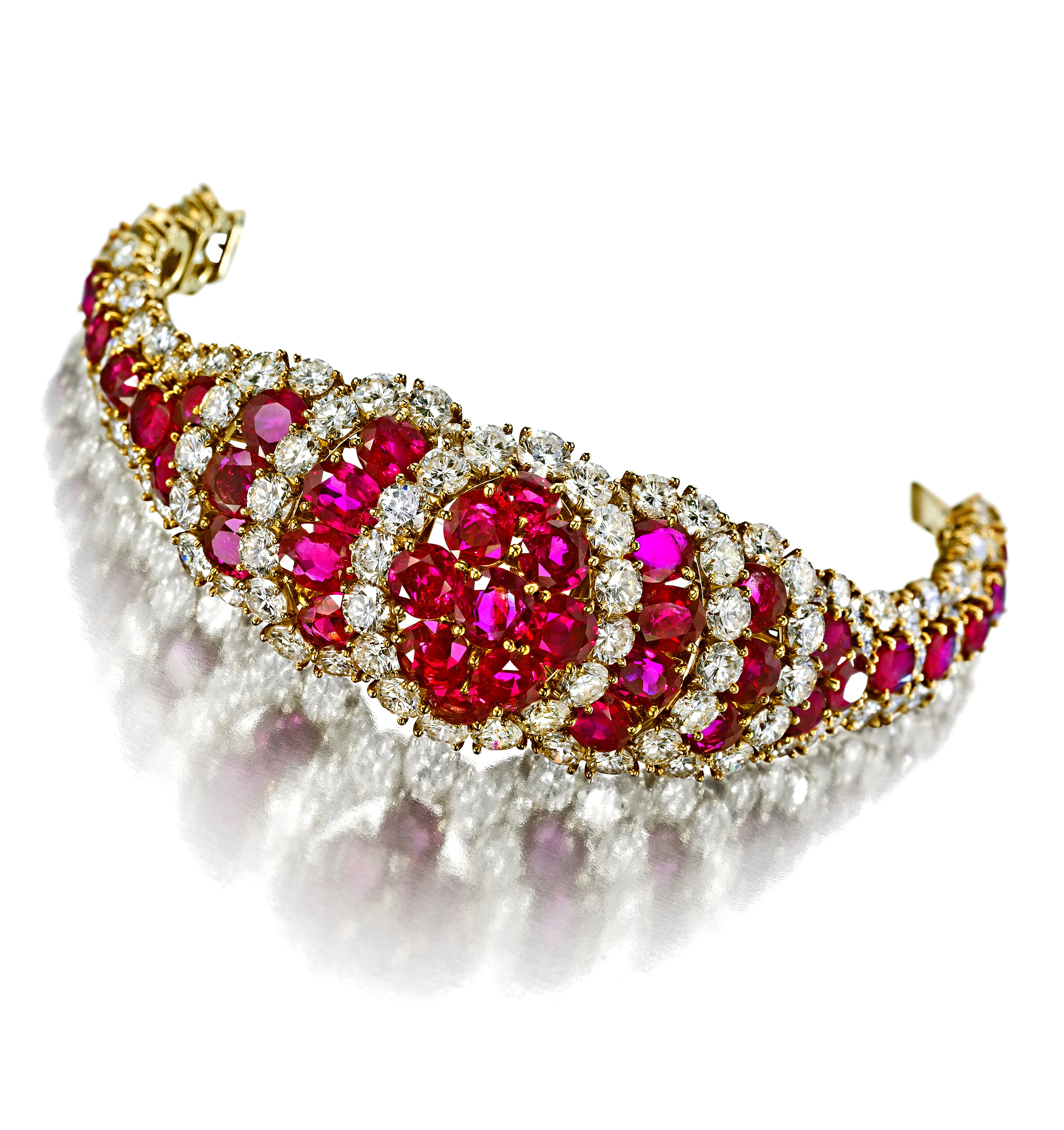 Among the large selection of signed Van Cleef & Arpels jewelry being auctioned by Bonhams is this ruby and diamond bracelet, which comes with a six-inch diamond extender to transform it into a striking choker. Image courtesy of Bonhams.