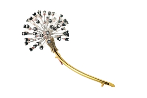 A delicate dandelion brooch from circa 1900 displays the divine versatility of Fabergé. Image courtesy of Wartski, London.