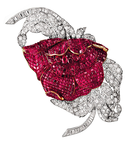 Mounted on platinum and gold, the petals of this Mystery Set Peony clip formerly belonging to Princess Faiza of Egypt are comprised of 700 square Burmese rubies, while 43 baguette and 196 round diamonds make up the foliage. Photo courtesy Van Cleef & Arpels. 