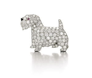 Dating back to the 1930s, Cartier’s diamond Norfolk Terrier brooch features a ruby eye and an onyx nose.