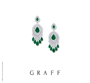 Stunning as part of the display is this pair of earrings featuring 23.33 carats of diamonds and 18.06 carats of emeralds. 