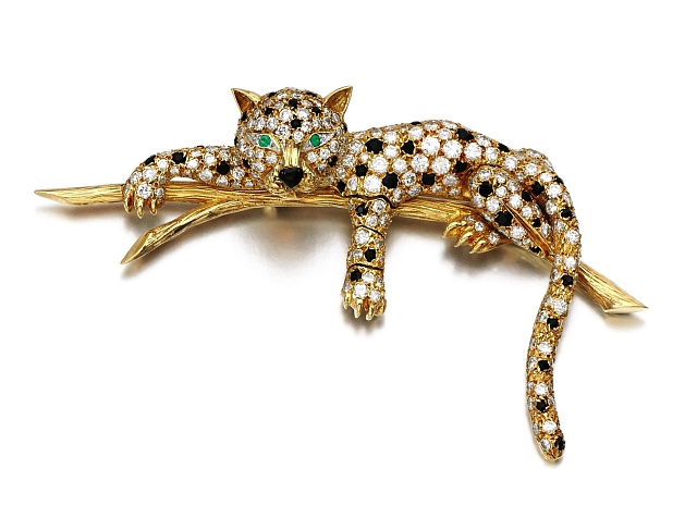 Cartier isn’t the only designer with an affection for panthers. Case in luxurious point, this emerald, onyx, and diamond brooch from Van Cleef & Arpels that delights with one of the big cats reclining on a tree branch. Photos courtesy Sotheby's.