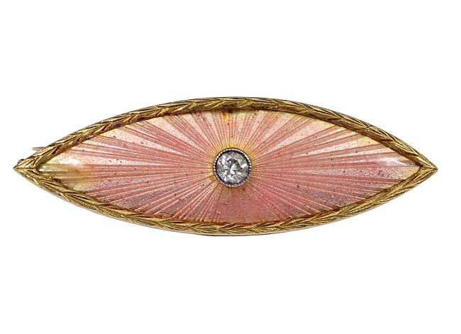 This gold and guilloche enamel brooch is by renowned Fabergé workmaster Henrik Wigstrom. Photos courtesy Auction Gallery of the Palm Beaches. 