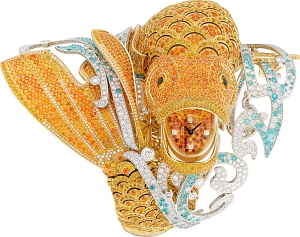 Unveiled at Salon de la Haute Horlogerie 2015, the high jewelry piece features a surprise dial set with precious stones.