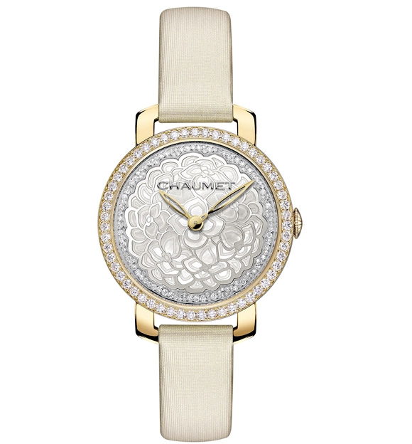 This Hortensia watch comes in yellow gold with diamonds and mother of pearl. Photo courtesy Chaumet. 