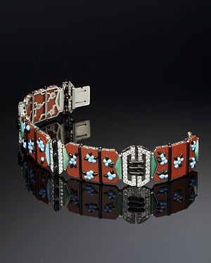 Boucheron's jasper, blue and black enamel, and turquoise bracelet boasts diamond-bedecked links. Photo courtesy TEFAF.