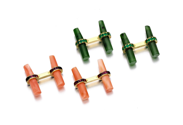 This pairing of ruby cufflinks by Boucheron and emerald Theo Fennell cufflinks come accompanied by interchangeable coral, nephrite, wood, and fluted batons. Photos courtesy Sotheby's.