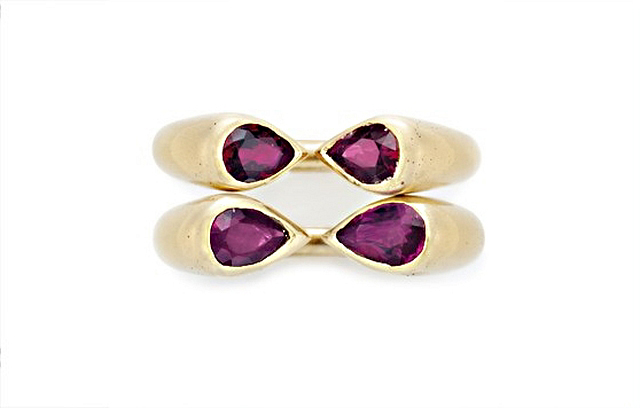 Along with pieces from Graff, Van Cleef & Arpels, Boucheron, and more, Christie's is auctioning off exclusive jewels by JAR. Above, a spectacular pair of the designer's ear clips have a cushion-cut diamond and a cushion-cut emerald, weighing approximately 8.5-carats and 11.24-carats, respectively, as their focal points. Photos courtesy Christie's Images LTD. 2015.