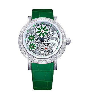 The timepiece's crocodile strap is available in white, green, red, or blue — the color of which corresponds to its stone.