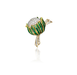 Lot 541, another Van Cleef & Arpels brooch, wows with its brilliant-cut diamond pistil, calibré-cut emerald petals and tapered baguette-cut diamond stem. 