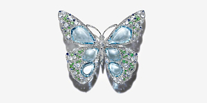 Aquamarines and moonstones evoke dewdrops on a butterfly’s wing in this butterfly brooch. 