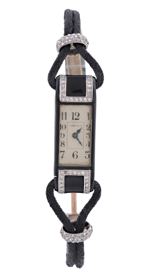 An Art Deco-style Cartier 18-carat gold diamond and black lacquer wristwatch. Photo courtesy Dreweatts and Bloomsbury.