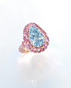 Lot 2105, a ring from discreet jeweler Moussaieff, is a standout with its pear-shaped fancy intense blue diamond surrounded by pink diamonds.