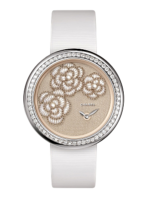 Chanel’s contribution? The exquisite Mademoiselle Privé for Only Watch, beguiling with hand-embroidered camellias on a delicate, pearl-bedecked fabric dial.