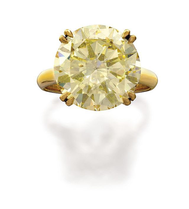 The top lot of the night was a 10.94-carat natural fancy yellow diamond ring, which sold for $225,700. Photos courtesy Sotheby's Australia. 