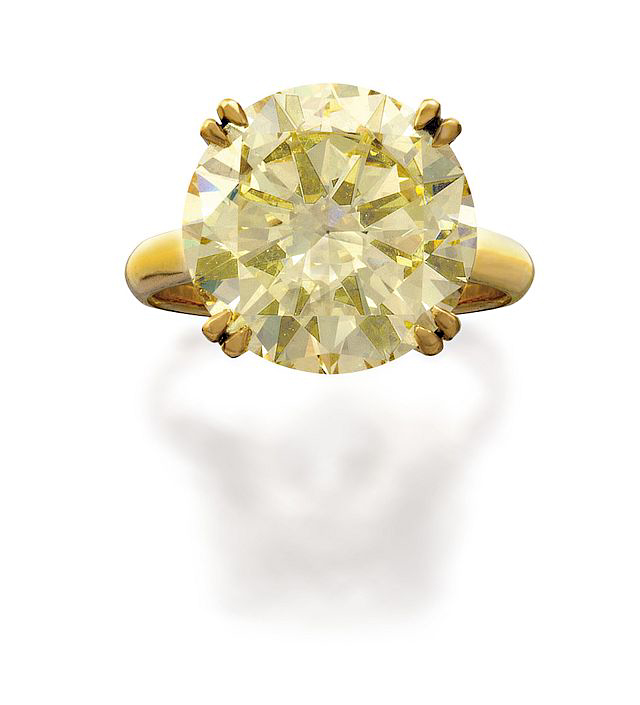 The top lot of the night was a 10.94-carat natural fancy yellow diamond ring, which sold for $225,700. Photos courtesy Sotheby's Australia.