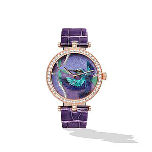 On the Lady Arpels Colibri Indigo watch, a hummingbird hovers over a flower made of hard stone marquetry and diamonds. Photo courtesy Van Cleef & Arpels. 