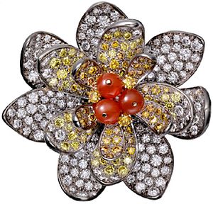 This high jewelry pendant comes in a dizzying array of white gold, agate, carnelian, yellow diamonds and diamonds. 