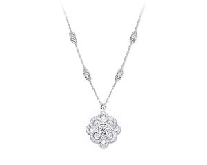 The Rosette collection’s pendants are suspended from refined chains with diamond and gemstone accents.