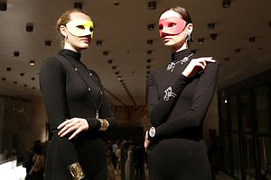 At the 2015 Winter Ball, masked models were draped in designs from various Van Cleef & Arpels collections, including the Perlée, Alhambra, and Oiseaux de Paradis lines.