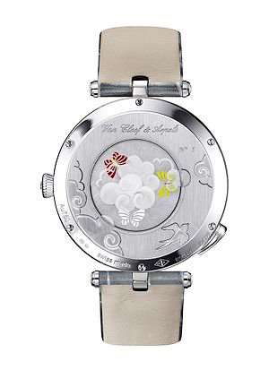 The diamond-framed dial’s idyllic scene is reimagined on the back of the case.