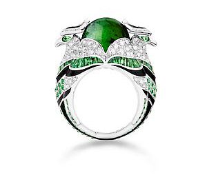 The alert birds guard over an 11-carat cabochon tourmaline mini in this version of the ring. 
